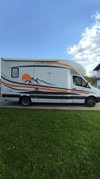 Camper van decorated with vinyl graphics